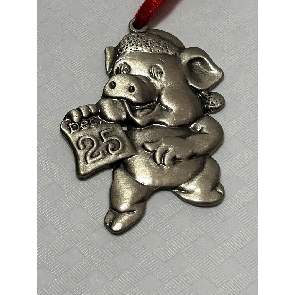 Christmas Pig With‎ Hat Holding a Dec. 25 Calendar Page Metal Ornament